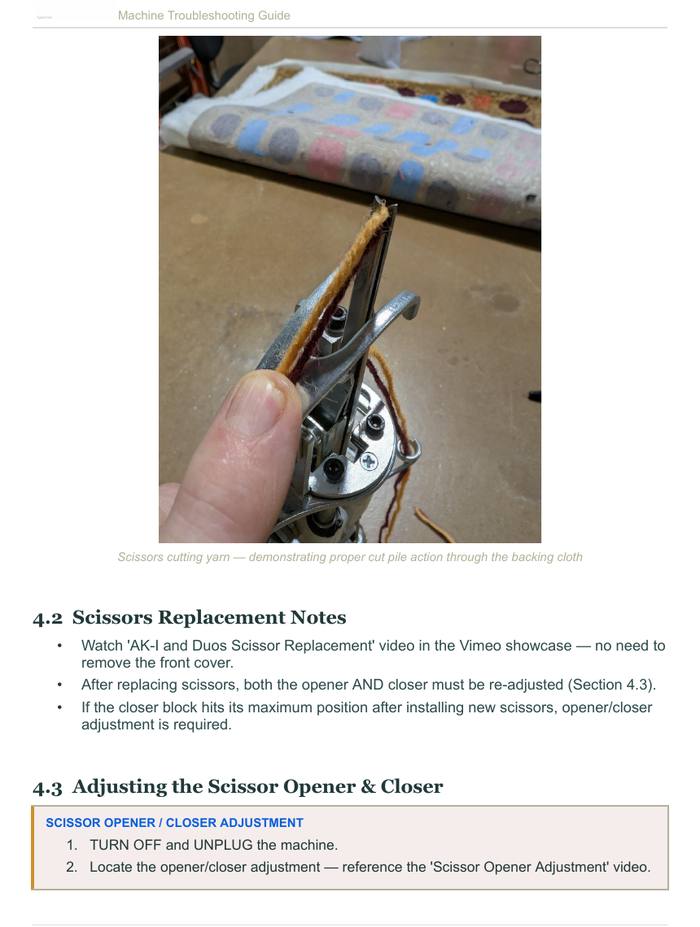 Scissors cutting yarn — demonstrating proper cut pile action through the backing cloth